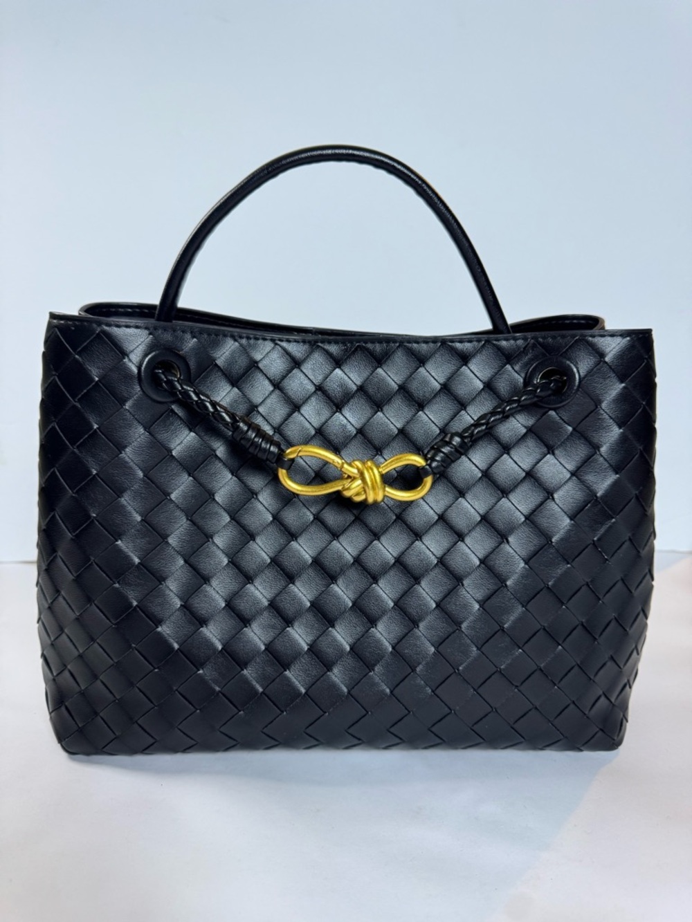 Black Woven Vegan Leather Tote with Gold Knot Accent